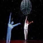 A live student actor onstage with a virtual counterpart